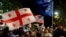 Участники акции протеста после парламентских выборов в Грузии в 2024 году