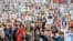 RUSSIA -- People carry portraits of people, including Red Army soldiers as they take part in the Immortal Regiment march on the Victory Day parade, which marks the anniversary of the victory over Nazi Germany in World War Two, in Vladivostok, Russia May 9