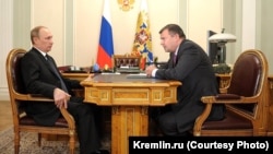 Андрей Бокарев (справа) на примеме у Владимира Путина в 2014 году