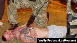 Yauhen (Yevgeny) Zaichkin, pictured here in a Reuters photo during the August 9, 2020 post-election protests in Minsk, Belarus was initially believed dead. 