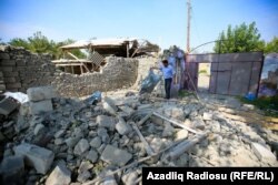 A destroyed home in Azerbaijan's Tartar district